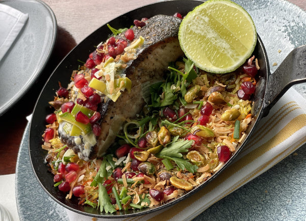 Pan Roasted Secret Island Salmon Over Persian Love Rice, Saffron, Pomegranate Butter & Pistachios Recipe