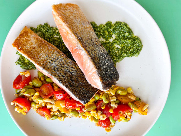 Crispy Pan Seared Salmon with Succotash + Cilantro Pesto Recipe