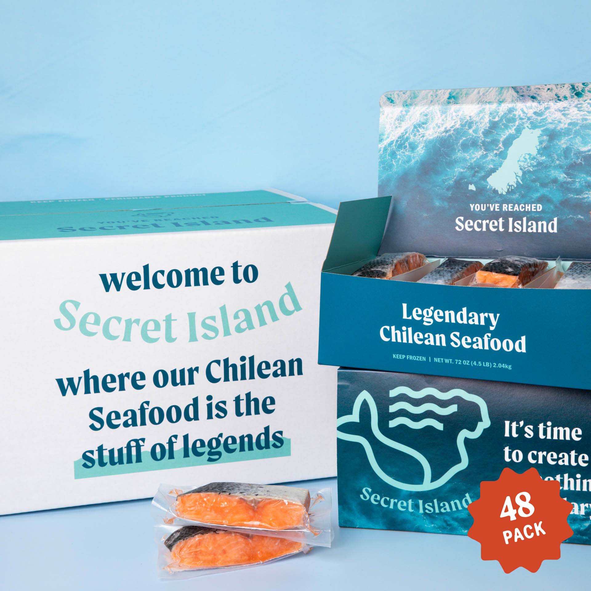 Three boxes of Secret Island Chilean salmon filets.