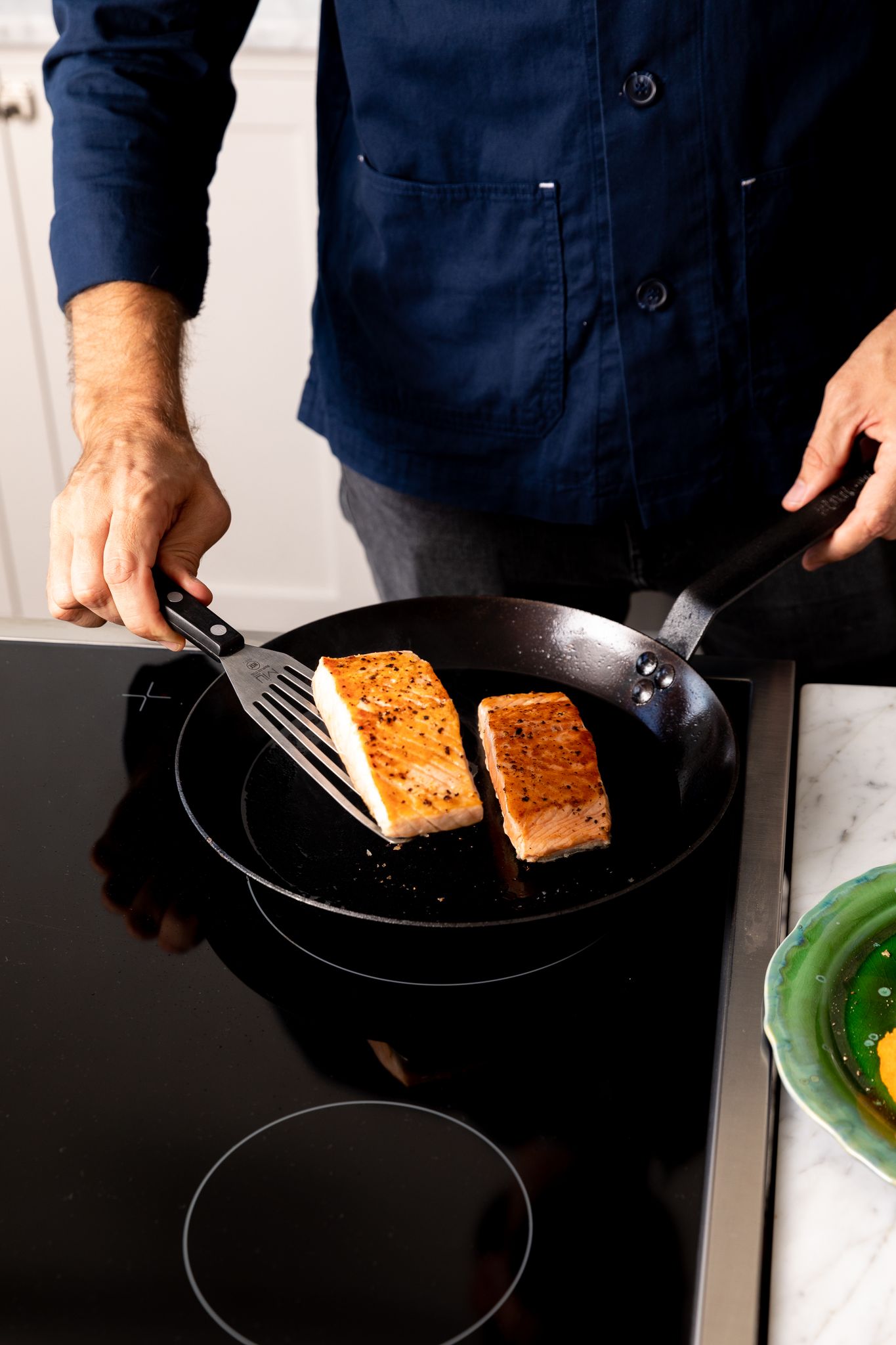 Cooking salmon in a pan